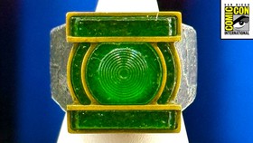 Green Lantern ring from Lanterns, San Diego Comic-Con logo in top right corner.