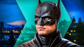 Batman, played by Robert Pattinson, Gotham city in background