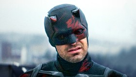 Daredevil, played by Charlie Cox, in black costume and helmet in Daredevil: Born Again Season 2.