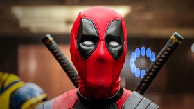 Deadpool in mask in TV in Deadpool and Wolverine
