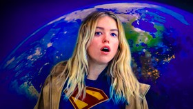 Milly Alcock as Supergirl, Earth behind her