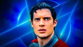 David Corenswet as Superman with glowing logo in background