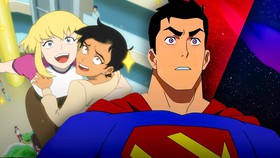 Supergirl holding Lois Lane; Superman in My Adventures With Superman.
