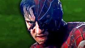 Tobey Maguire as Spider-Man with ripped mask