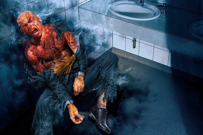 Etrigan beginning to transform in public bathroom