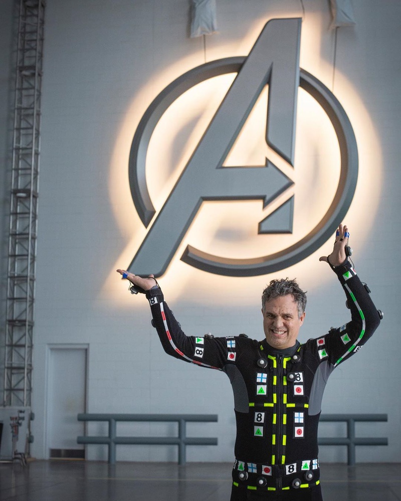 Mark Ruffalo with the Avengers Logo