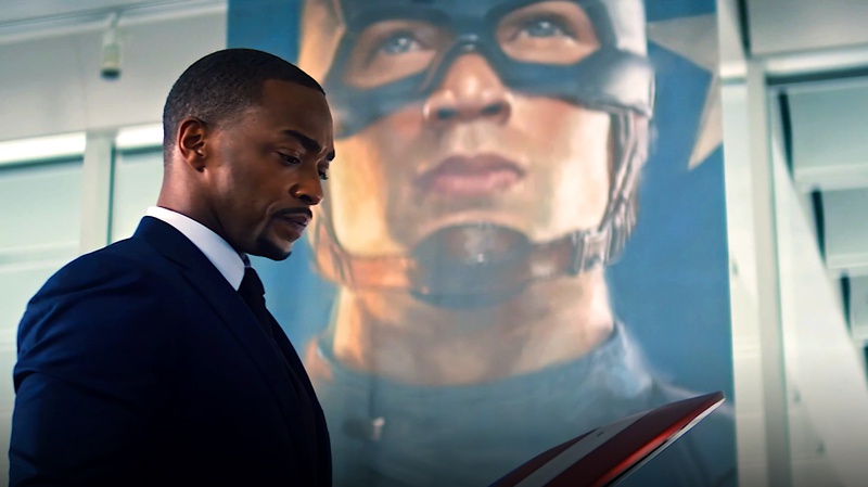 Falcon with Captain America banner behind him