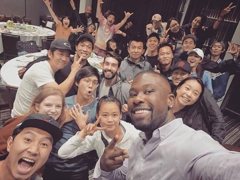 Simu Liu and the cast and crew of Shang-Chi